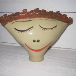 Stockfigur/gedreht